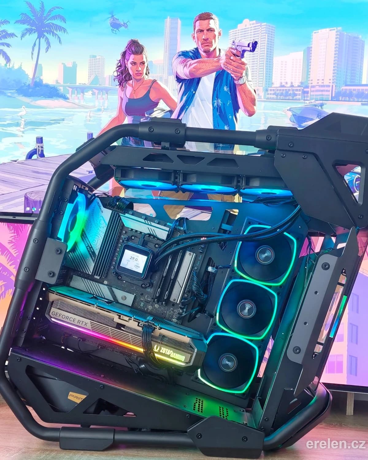 Gaming PC in the open Cougar Cratus case with an RTX 5080, a liquid cooler with a display and colourful lighting