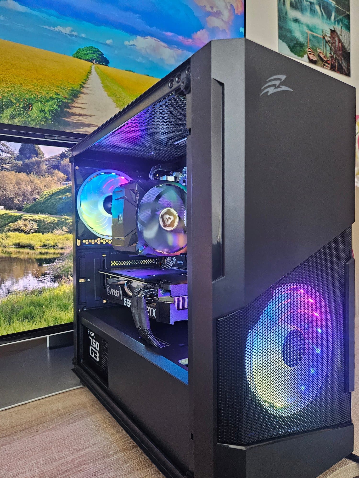 Montech open-frame gaming PC with ASUS ROG GPU and dual monitor setup – Erelen